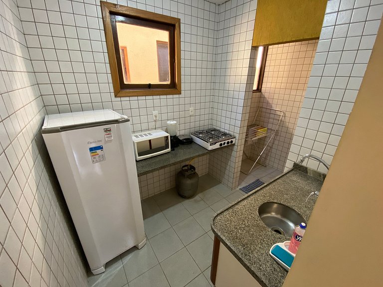 128 - quarto e sala a 100m da praia